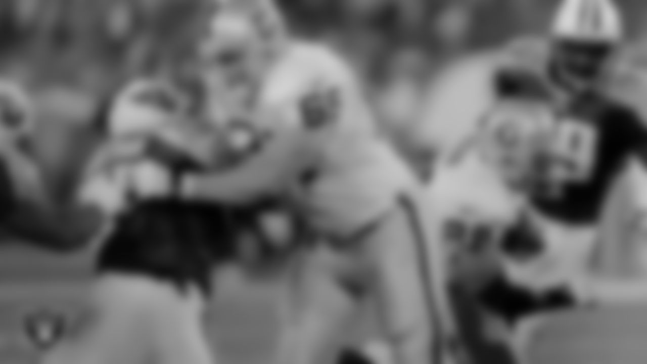 Oakland Raiders tackle Barry Sims (65) and running back Napoleon Kaufman (26) during the regular season away game against the Tennessee Titans at Adelphia Coliseum, Thursday, December 9, 1999, in Nashville, Tenn.