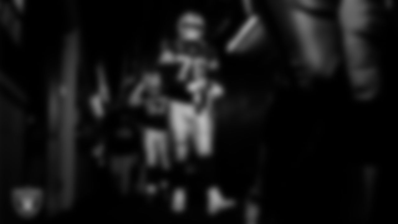 Las Vegas Raiders guard Caleb Rogers (76) walks down the tunnel before the regular season home game against the New York Giants at Allegiant Stadium.