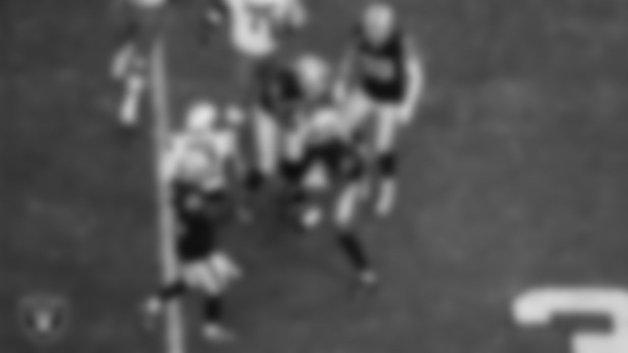Las Vegas Raiders defensive end Malcolm Koonce (51) celebrates with teammates after sacking the quarterback during the regular season home game against the Cleveland Browns at Allegiant Stadium.