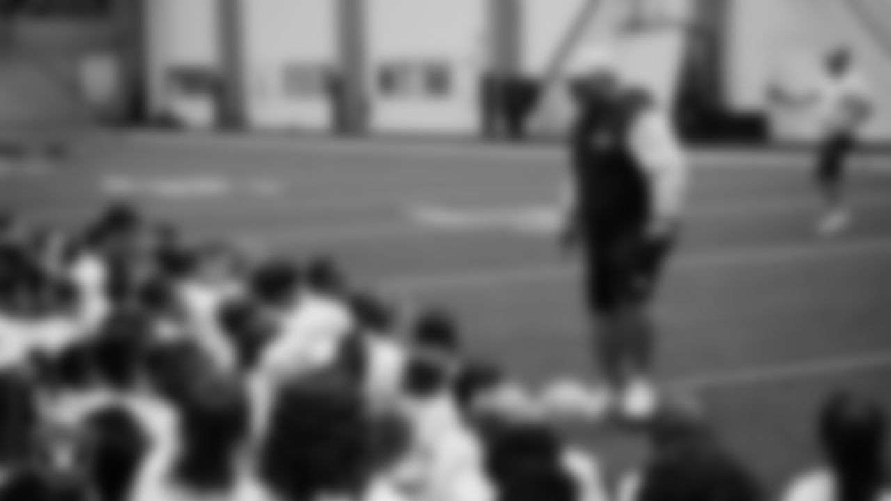 Las Vegas Raiders senior manager of football development Jordan Aguilar hypes up athletes at a skills camp during Play Football Day at Intermountain Health Performance Center.