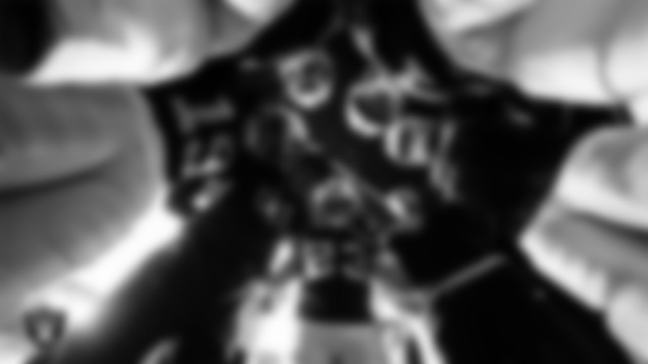 The Las Vegas Raiders returners huddle in the tunnel before the regular season home game against the Denver Broncos at Allegiant Stadium.