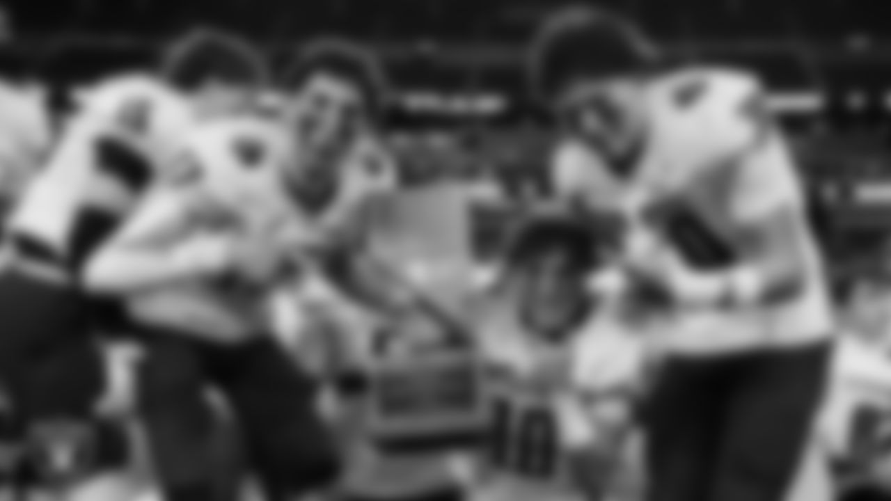 The Spanish Springs High School football team celebrates after defeating Faith Lutheran High School in the NIAA 5A Division State Championship game at Allegiant Stadium.