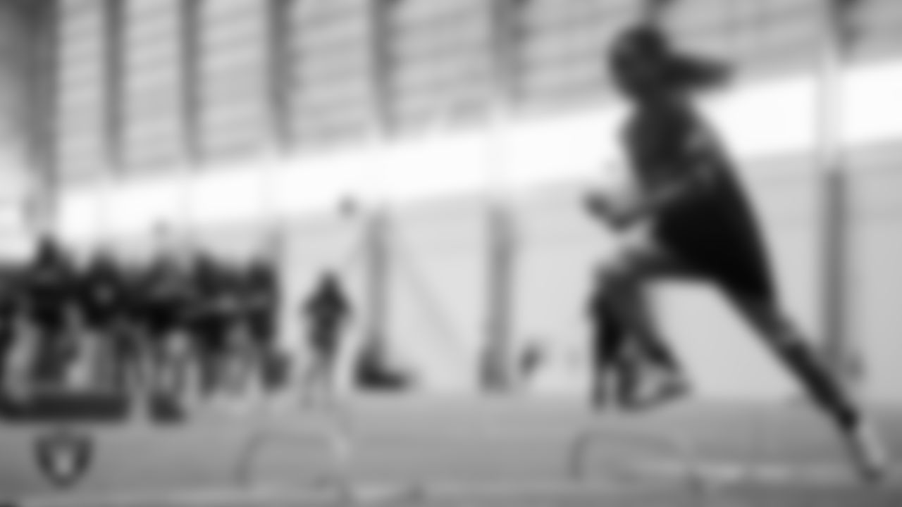 A student goes through a drill during a Raiders Junior Training Camp at Intermountain Health Performance Center.