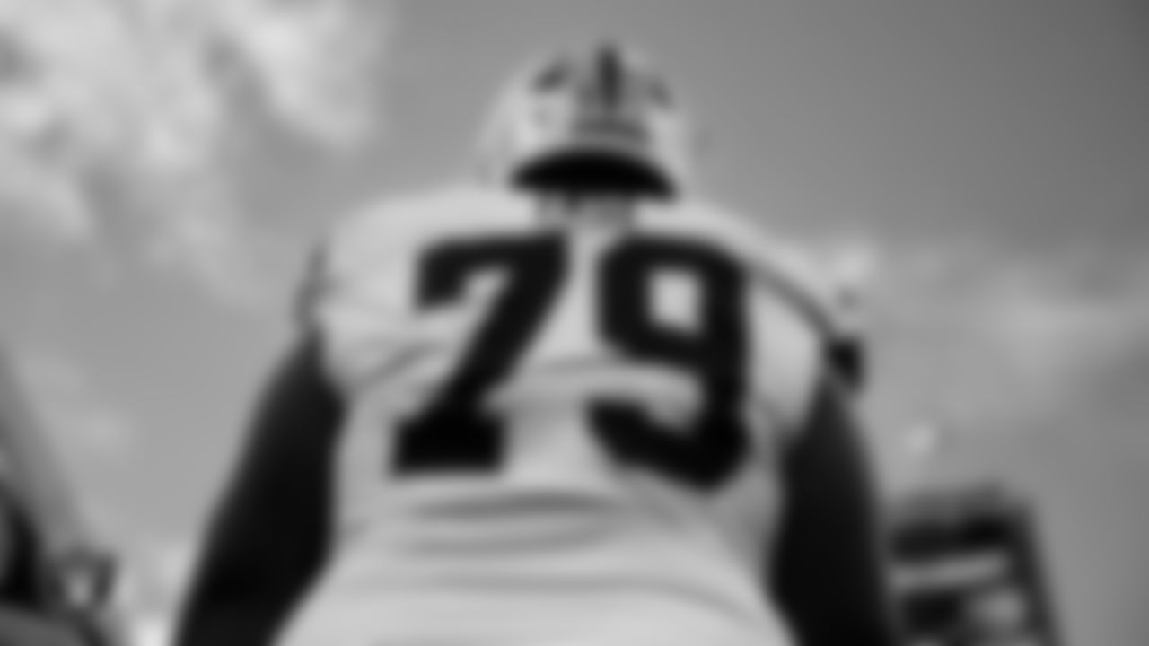 Las Vegas Raiders offensive lineman Laki Tasi (79) warming up before the preseason away game against the Seattle Seahawks at Lumen Field.
