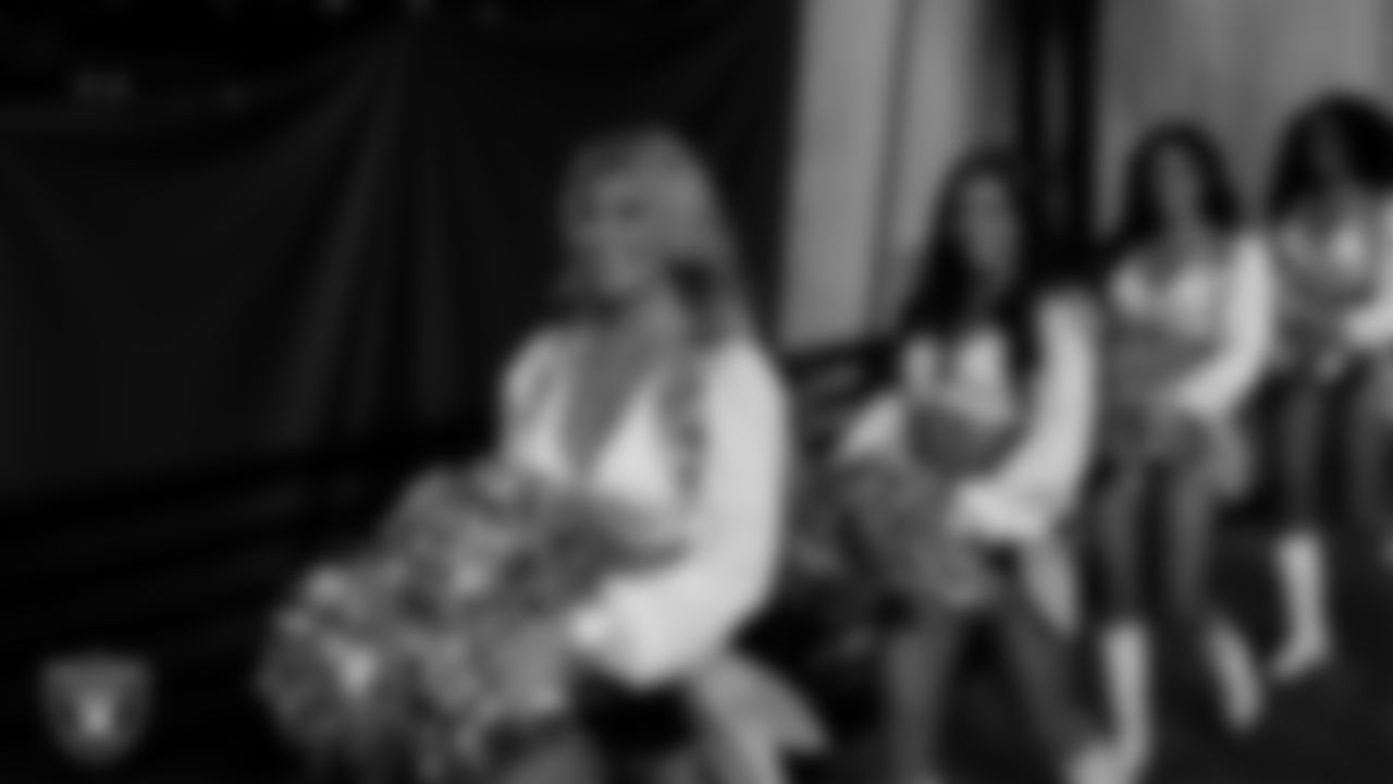 Raiderette Isabella walks through the tunnel before the regular season home game against the Dallas Cowboys at Allegiant Stadium.