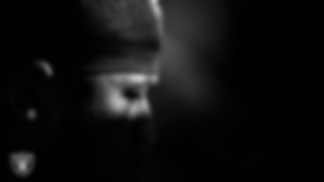 Las Vegas Raiders defensive tackle Jonah Laulu (96) on the bench during the regular season away game against the Houston Texans at NRG Stadium.