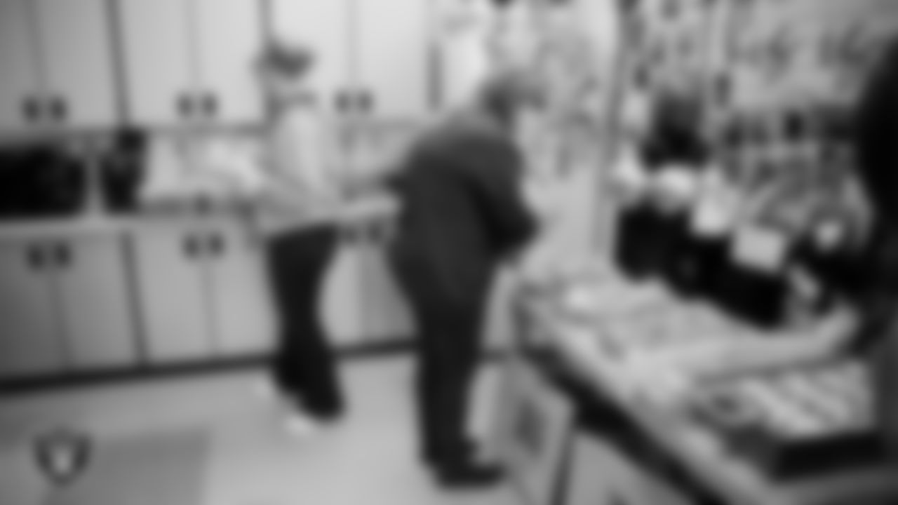 Richard H. Bryan Elementary School teachers enjoy a meal in the teacher's lounge during a Raiders Spirit Day at Richard H. Bryan Elementary School.