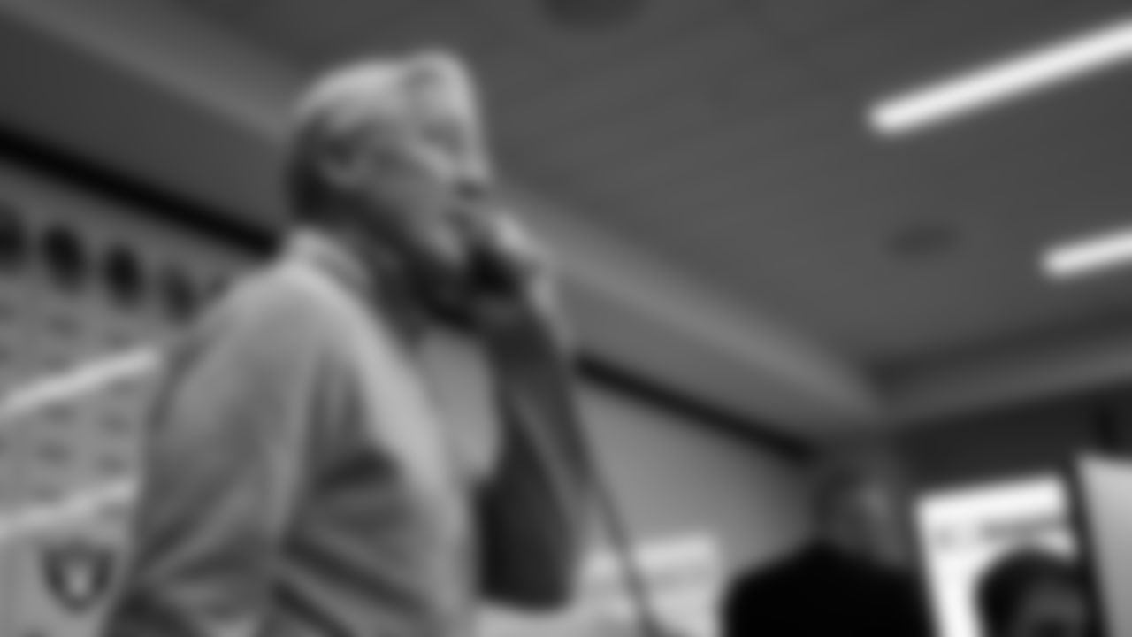 Las Vegas Raiders Head Coach Pete Carroll speaks on the phone with Boise State running back Ashton Jeanty in the draft room on day 1 of the 2025 NFL Draft at Las Vegas Raiders Headquarters.