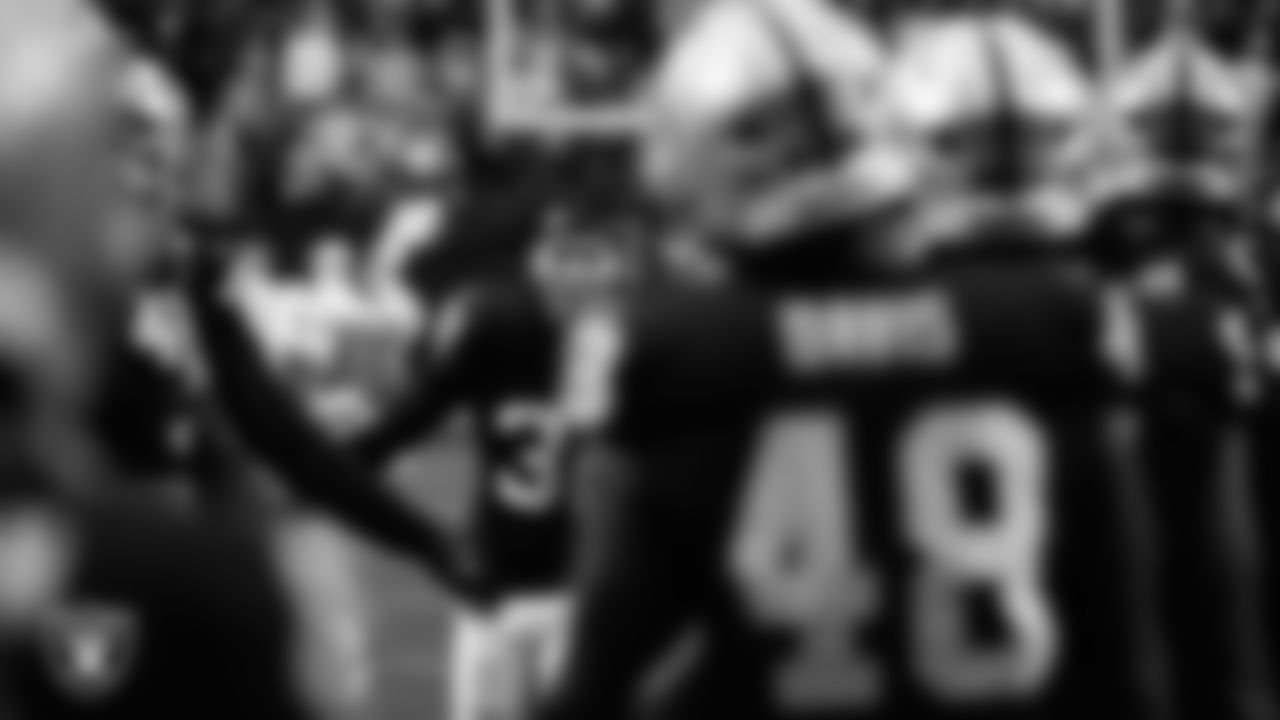 Las Vegas Raiders safety Lonnie Johnson Jr. (32) is introduced onto the field before the regular season home game against the Kansas City Chiefs at Allegiant Stadium.