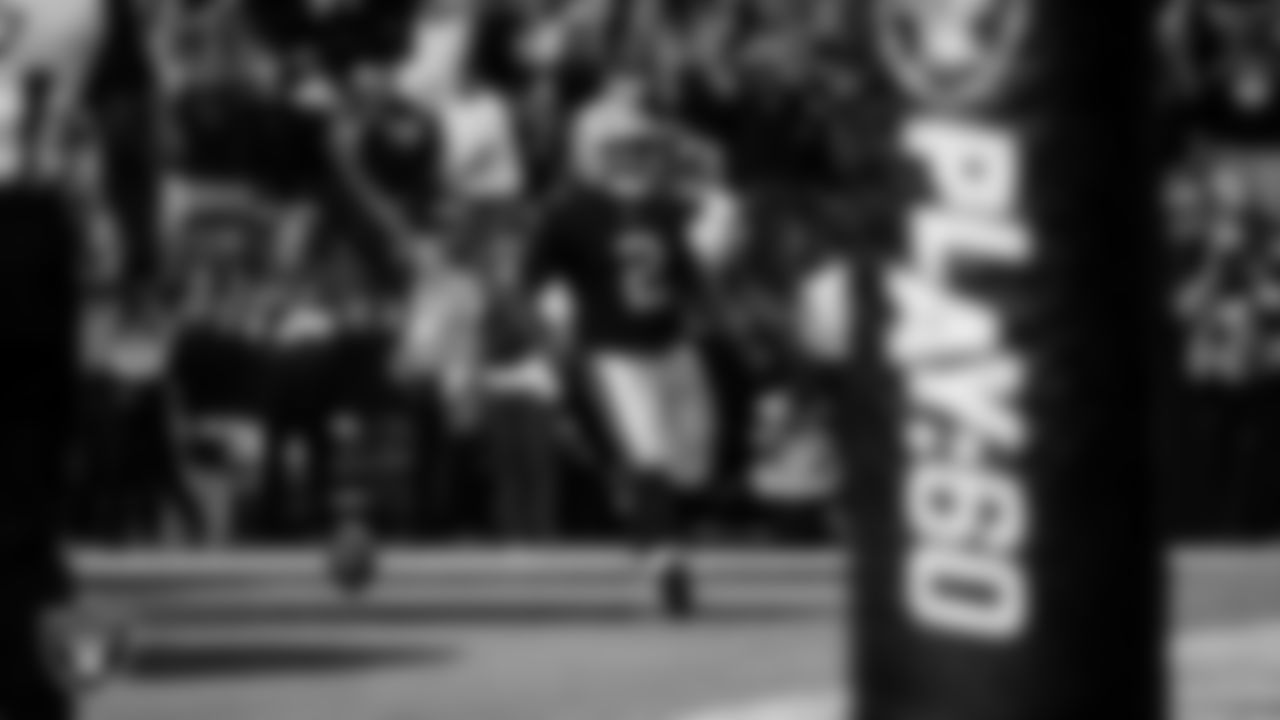 Las Vegas Raiders running back Ashton Jeanty (2) runs after making a 15-yard touchdown catch during the regular season home game against the Jacksonville Jaguars at Allegiant Stadium.