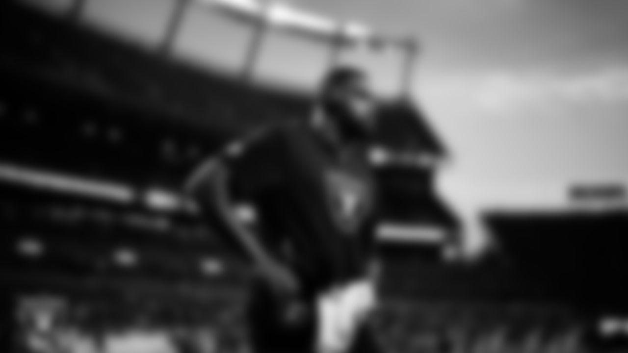 Las Vegas Raiders linebacker Jamal Adams (33) warming up before the regular season away game against the Denver Broncos at Empower Field at Mile High.