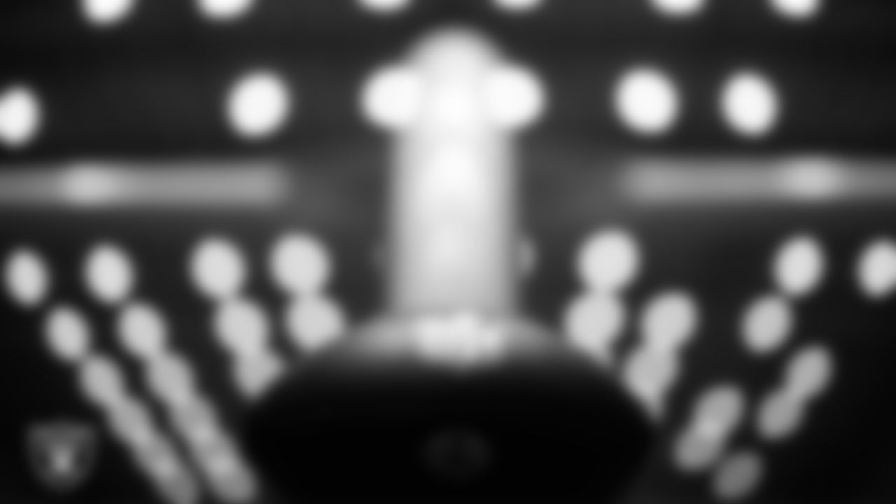 A football on the field during practice at Intermountain Health Performance Center.