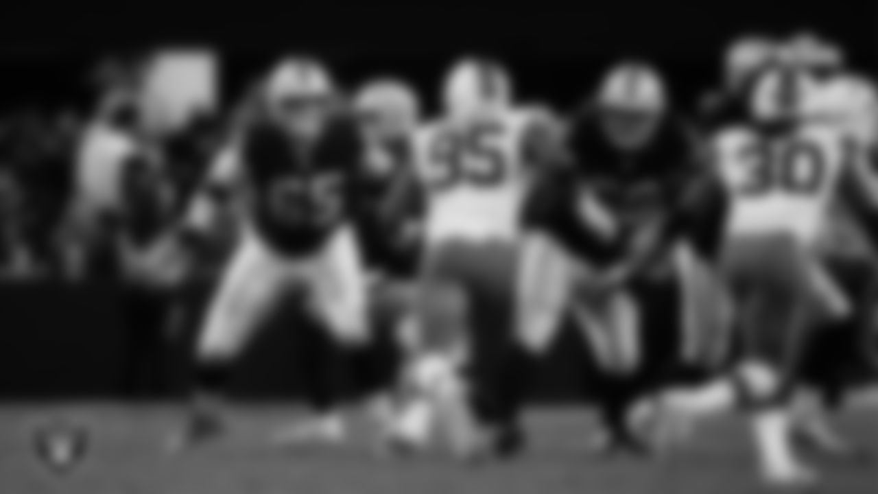 Las Vegas Raiders guard Alex Cappa (65) and guard Dylan Parham (66) block during the regular season home game against the Cleveland Browns at Allegiant Stadium.