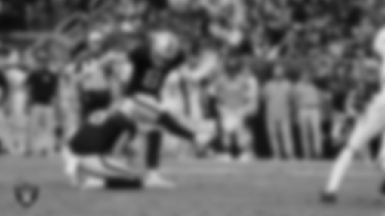 Las Vegas Raiders kicker Daniel Carlson (8) kicks a 29-yard field goal during the regular season home game against the Tennessee Titans at Allegiant Stadium.