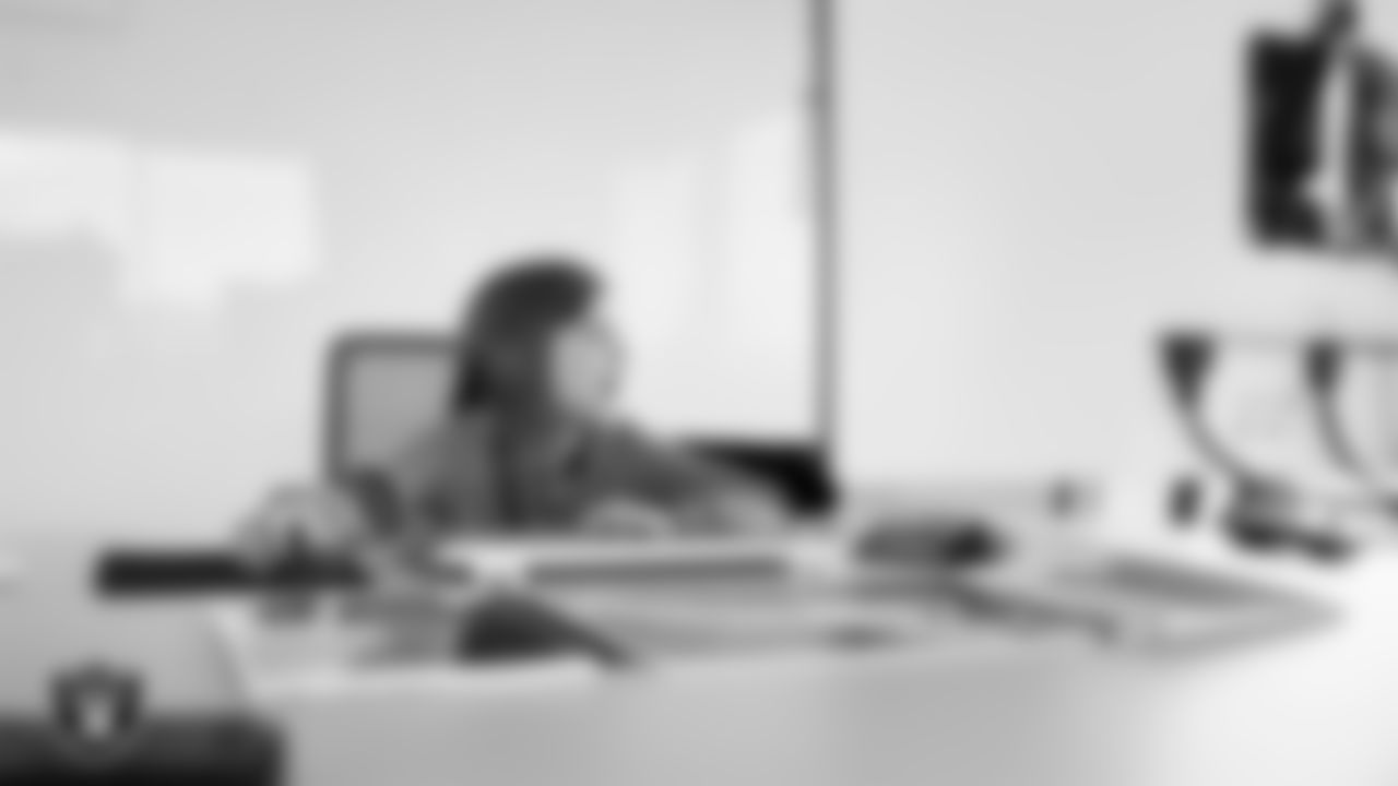 Las Vegas Raiders Head Coach Klint Kubiak's daughter in his office at Intermountain Health Performance Center.