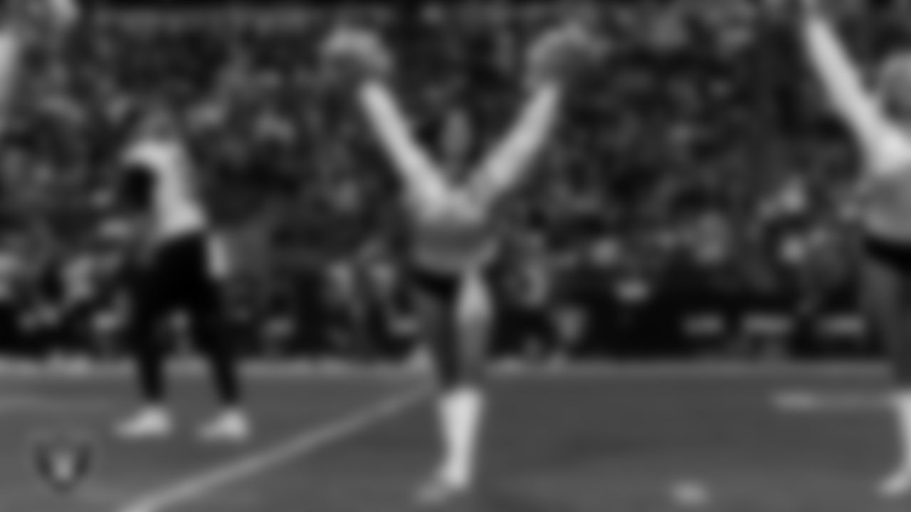 Raiderette Tatiana during player introductions before the regular season home game against the Jacksonville Jaguars at Allegiant Stadium.