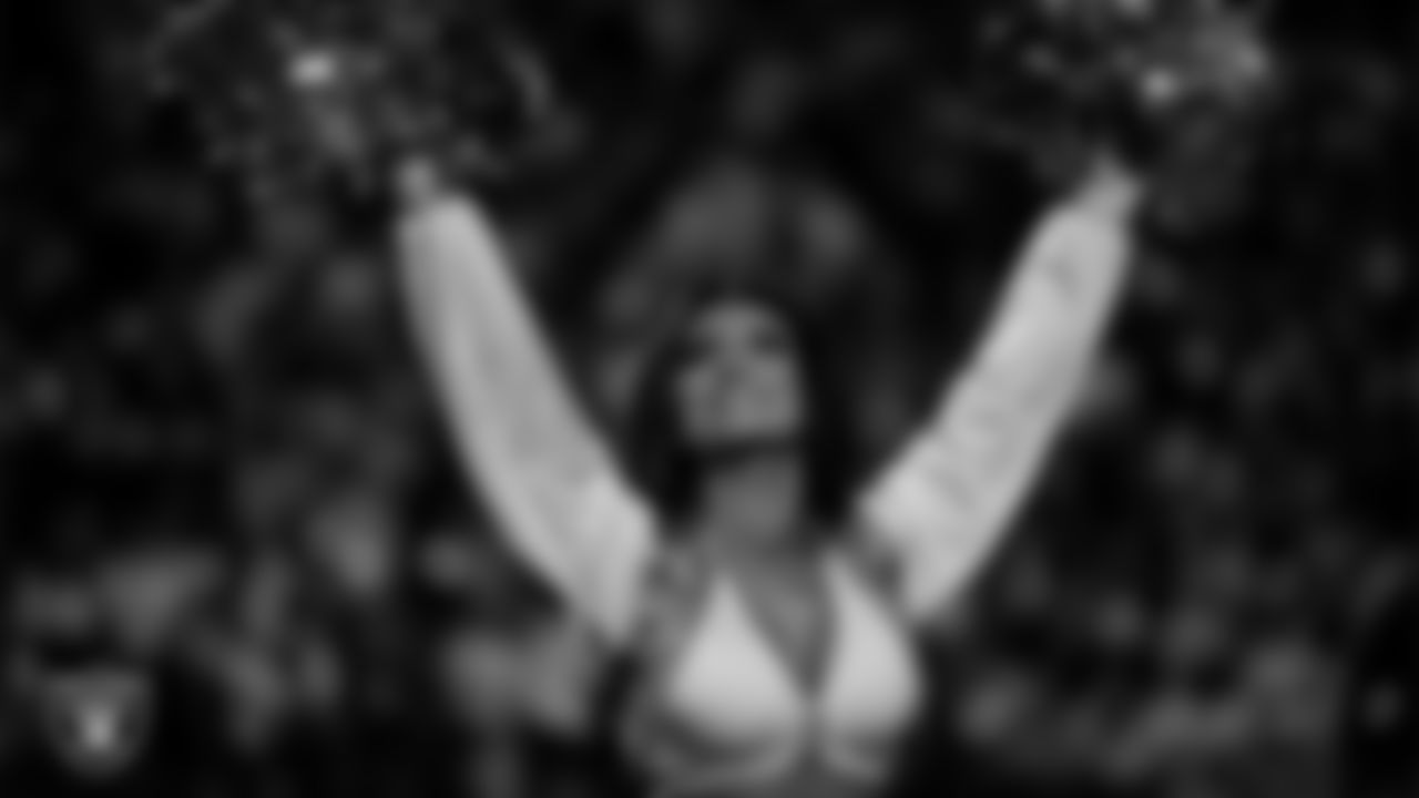 Raiderette Kylee during player introductions before the regular season home game against the Dallas Cowboys at Allegiant Stadium.