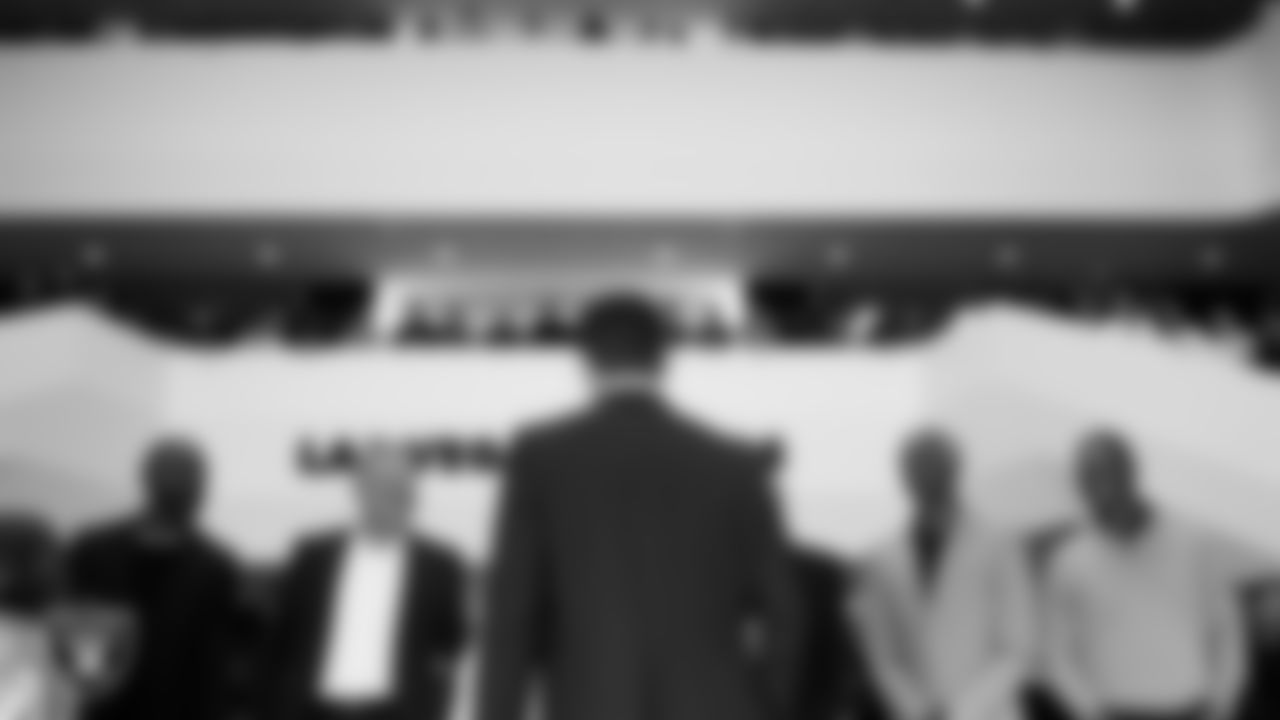 Las Vegas Raiders Head Coach Klint Kubiak is welcomed by alumni, players and staff to Intermountain Health Performance Center.