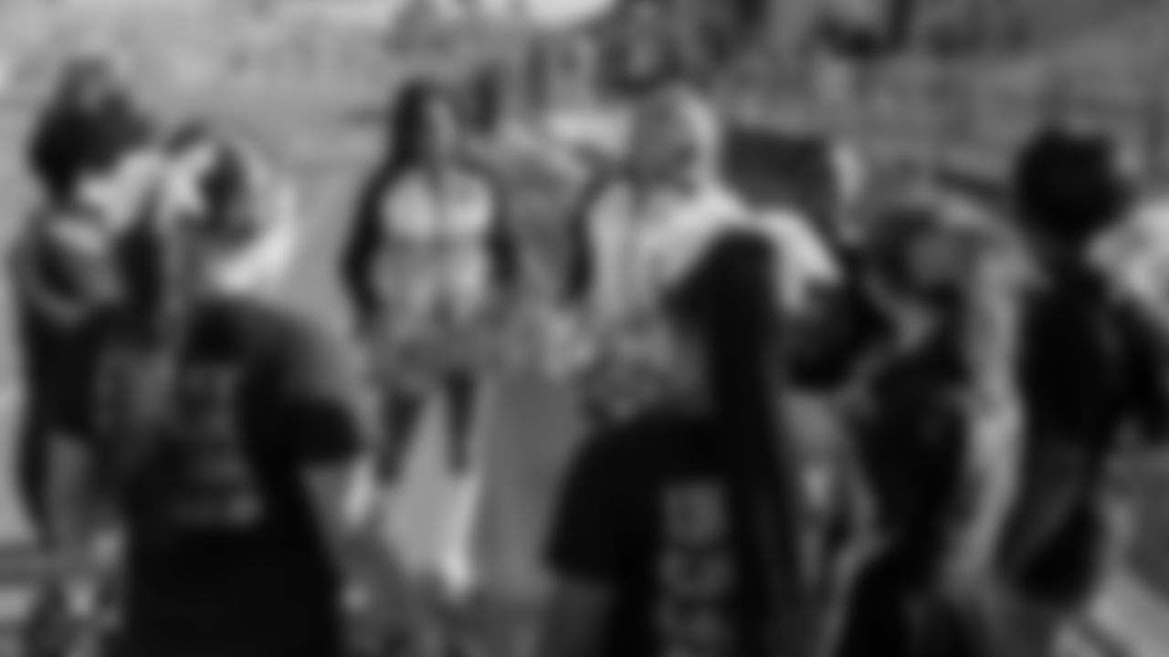 Raiderettes Meekela and Hayley speak to Chaparral High School cheerleaders before the Las Vegas Raiders' Football Showcase game at Chaparral High School.