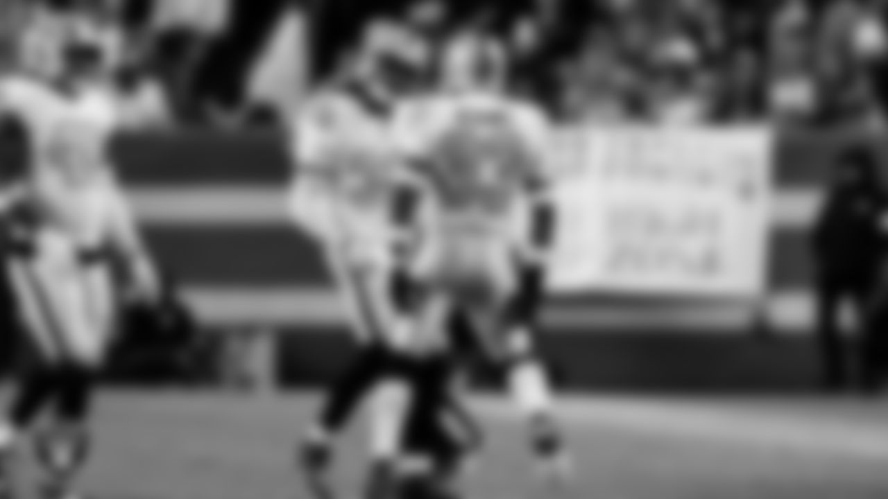 Las Vegas Raiders safety Lonnie Johnson Jr. (32) and linebacker Jamal Adams (33) during the regular season away game against the Denver Broncos at Empower Field at Mile High.