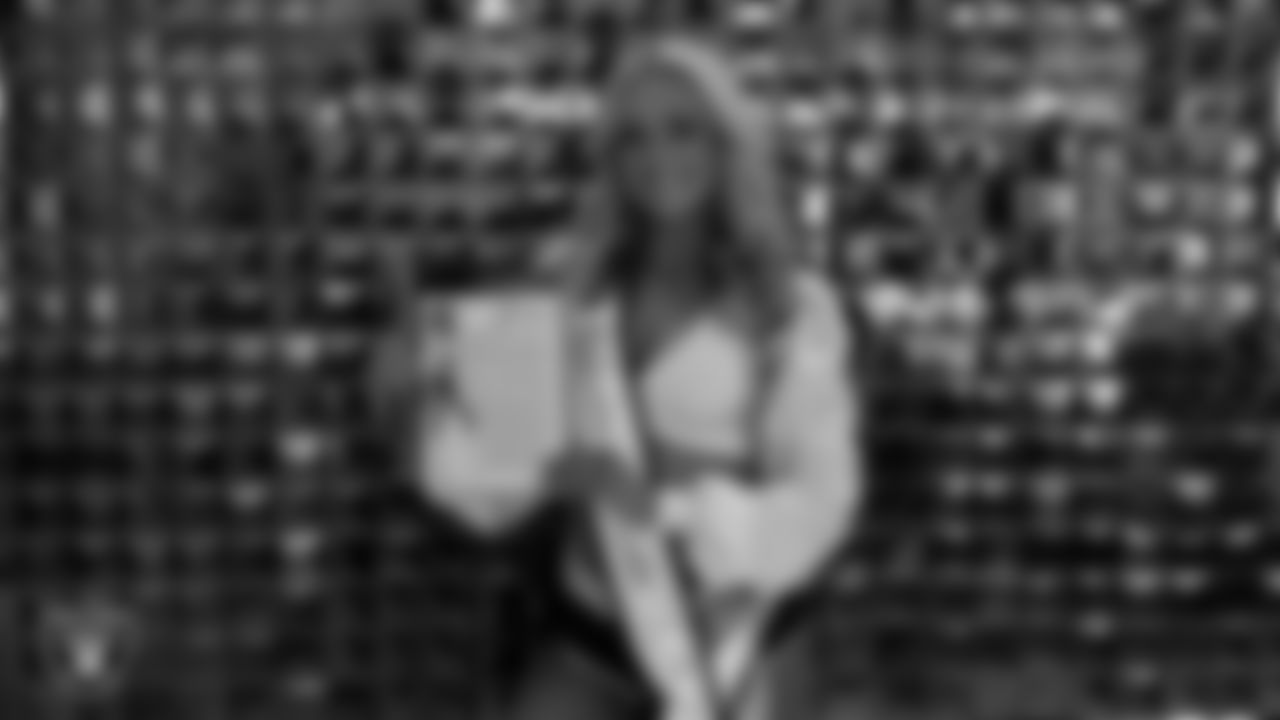 Raiderette Jessica is named Raiderette of the Game in the locker room before the regular season home game against the Dallas Cowboys at Allegiant Stadium.