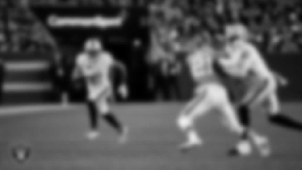Las Vegas Raiders running back Raheem Mostert (31) runs after making a catch during the regular season away game against the Denver Broncos at Empower Field at Mile High.