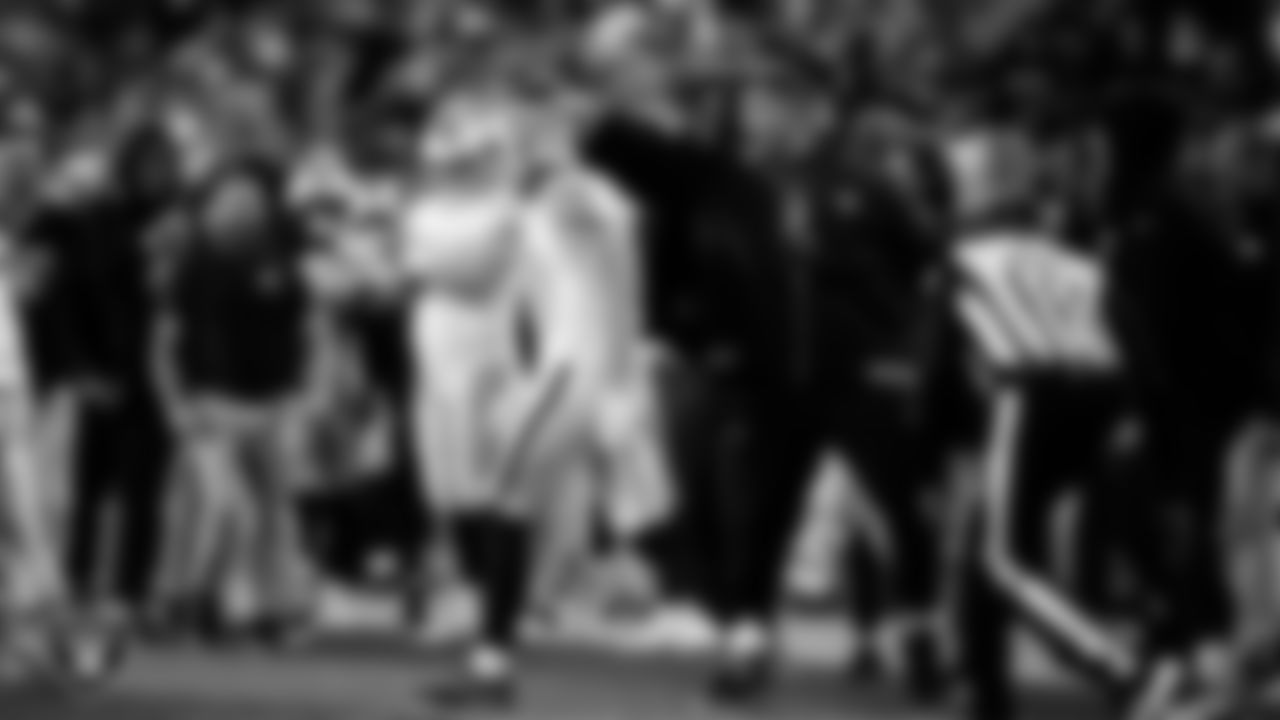 Las Vegas Raiders tight end Brock Bowers (89) celebrates with teammates after making a first down during the regular season away game against the Denver Broncos at Empower Field at Mile High.