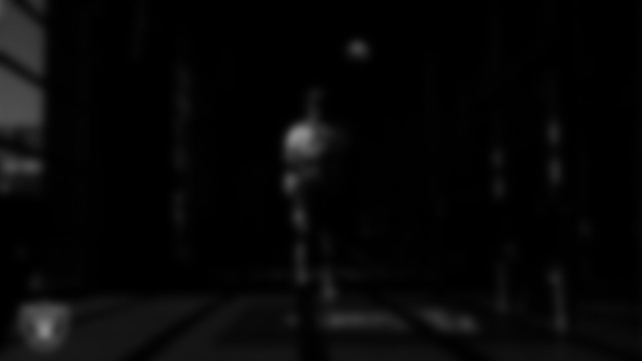 Las Vegas Raiders defensive end Jahfari Harvey (91) walks out to the field for practice at Intermountain Health Performance Center.