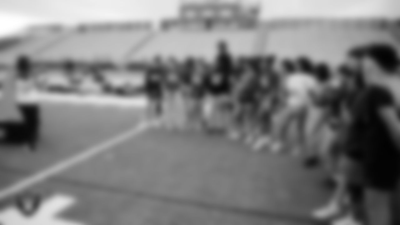 Las Vegas Raiders manager of football development Marli Bartlett presents new Nike sports bras to the Sierra Vista High School flag football team during practice at Sierra Vista High School.