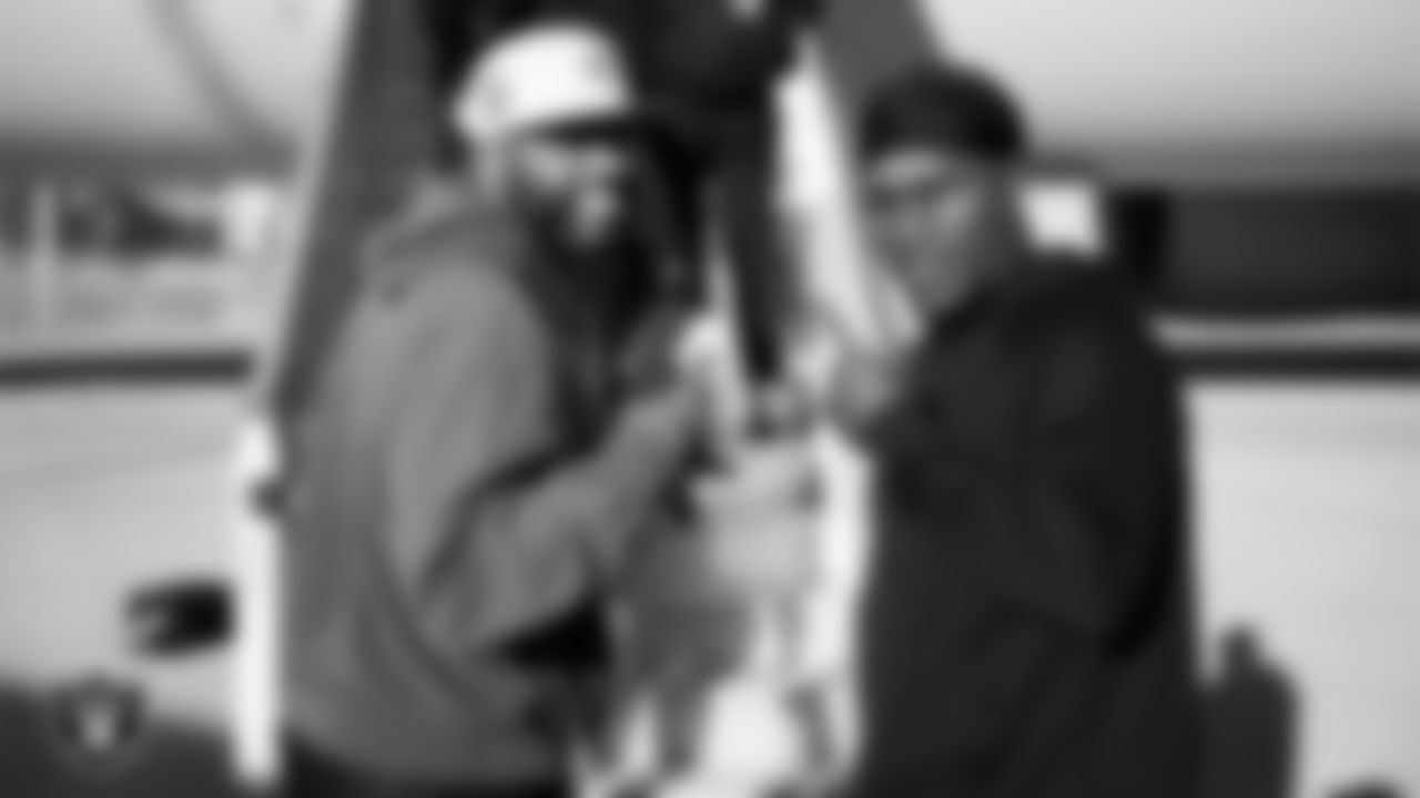 Las Vegas Raiders linebacker Elandon Roberts (52) and cornerback Darnay Holmes (30) depart for the regular season away game against the Philadelphia Eagles.