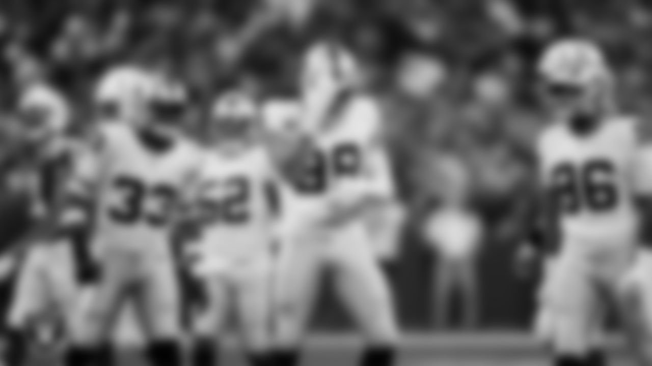 Las Vegas Raiders defensive end Maxx Crosby (98) celebrates after making a tackle during the regular season away game against the Indianapolis Colts at Lucas Oil Stadium.