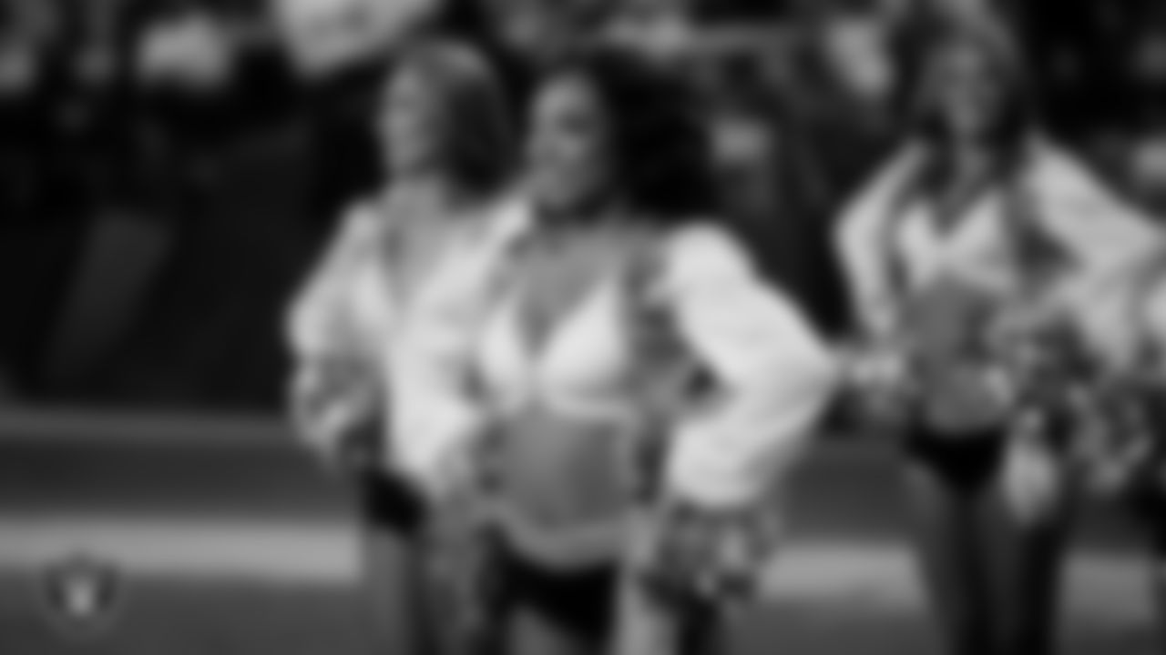 Raiderette Bria waits to take the field for a performance during the regular season home game against the Dallas Cowboys at Allegiant Stadium.