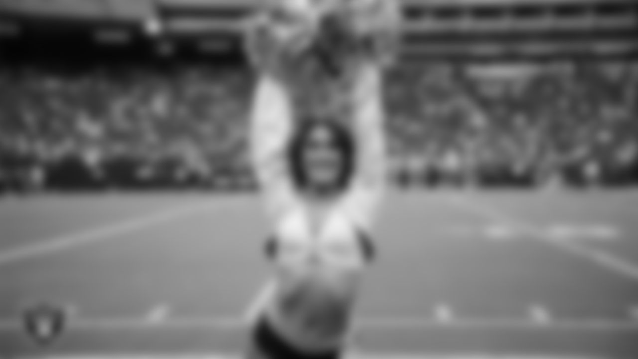 Raiderette Macy on the sidelines during a 2025 Training Camp mock game at Allegiant Stadium.