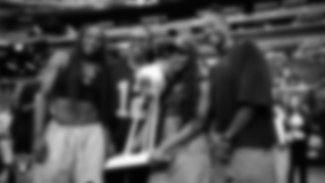The Las Vegas Aces before the regular season home game against the Tennessee Titans at Allegiant Stadium.