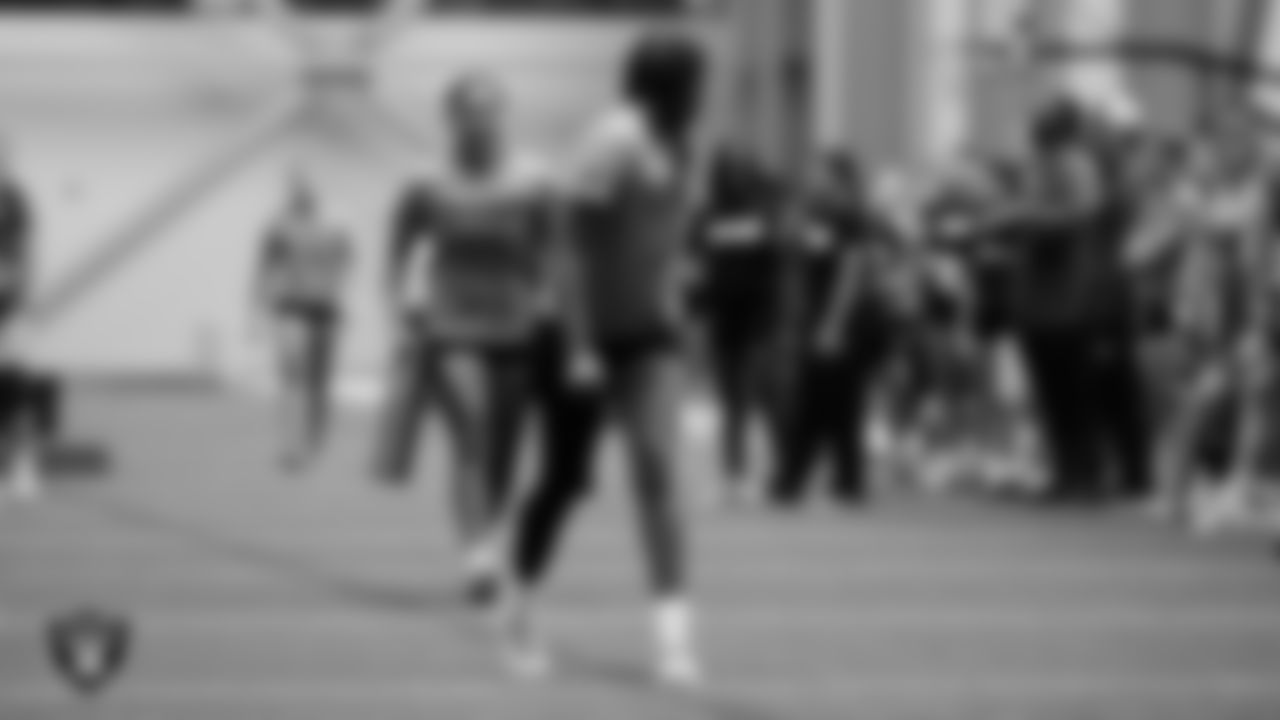 Athletes compete in a relay race during a Nike 11-On event at Intermountain Health Performance Center.