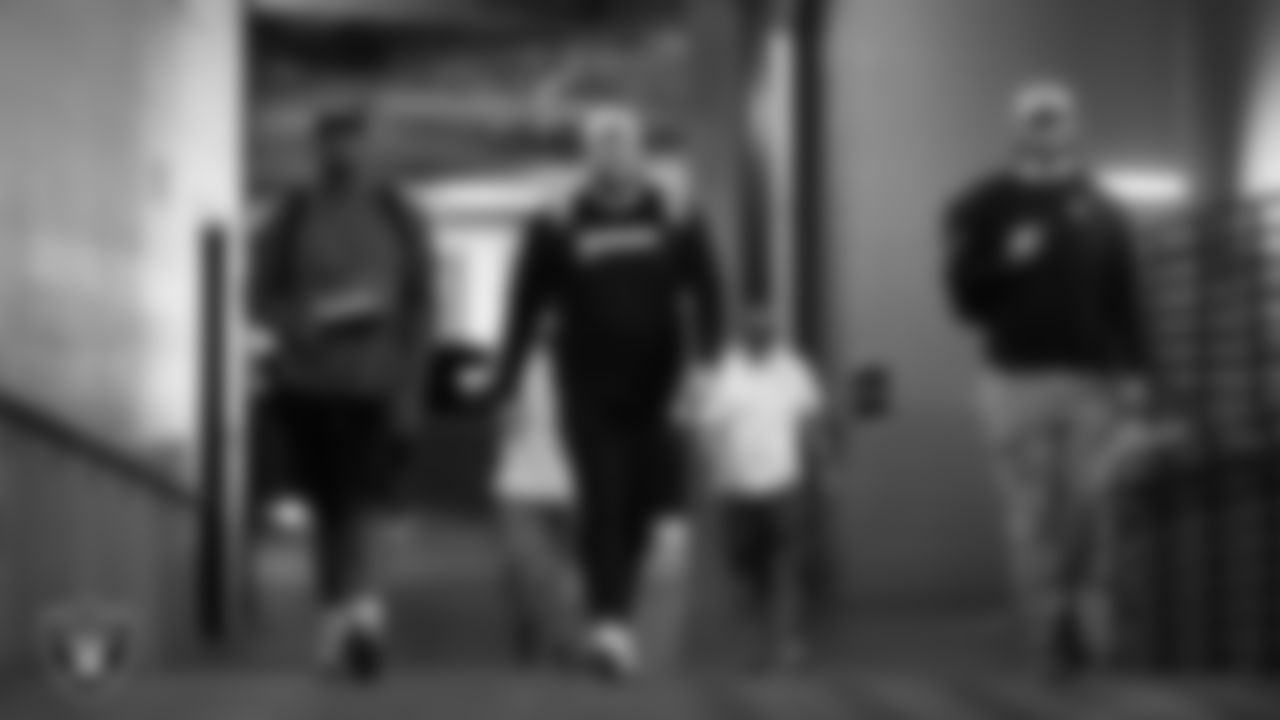 Las Vegas Raiders tackle Charles Grant (60), center Jarrod Hufford (64) and tackle Parker Clements (70) arrive to the preseason home game against the San Francisco 49ers at Allegiant Stadium.