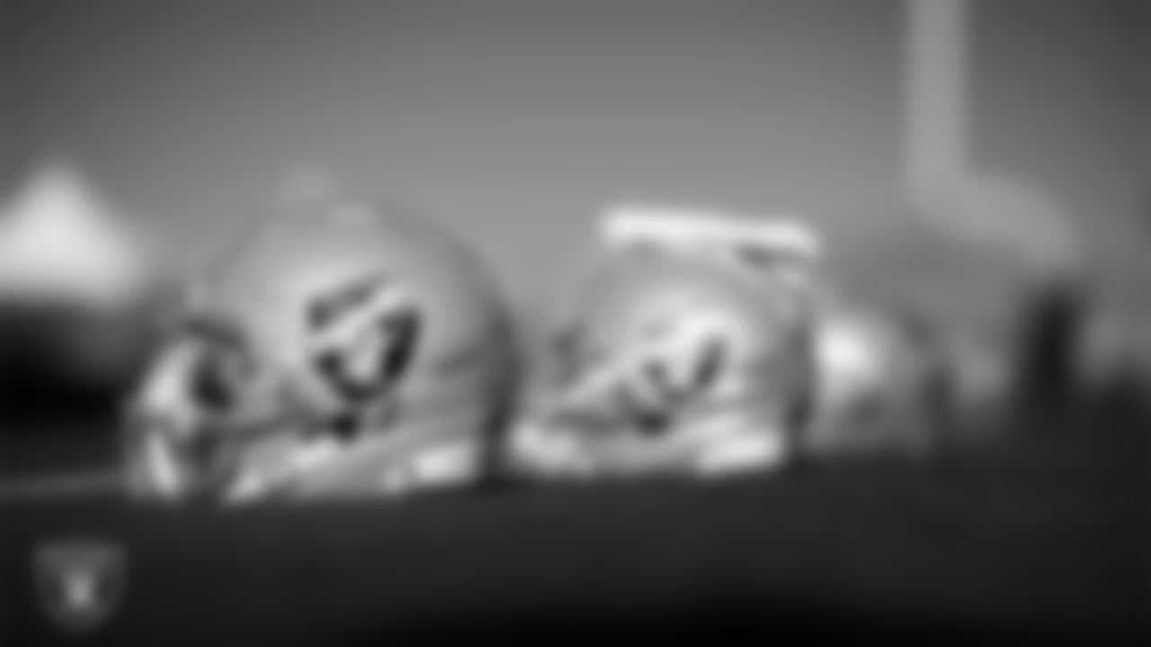 Helmets on the field for practice at 2025 Training Camp at Intermountain Health Performance Center.