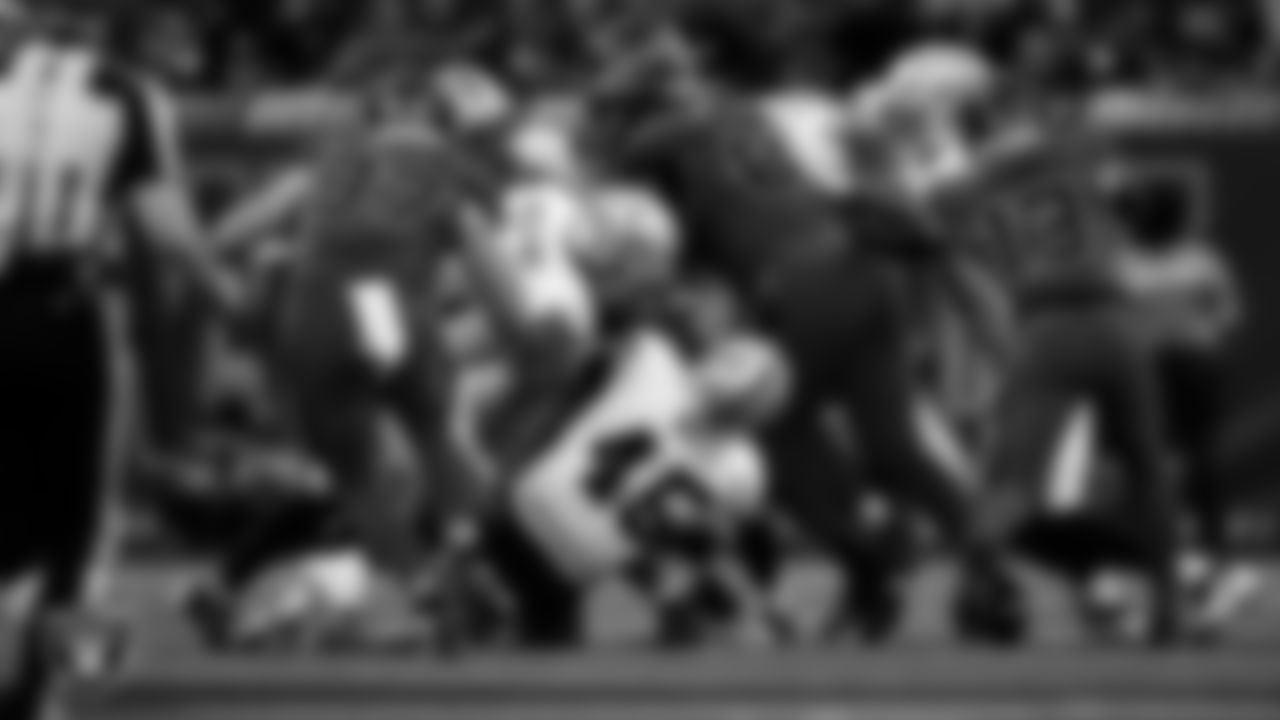 Las Vegas Raiders safety Isaiah Pola-Mao (20) and linebacker Devin White (45) make a tackle during the regular season away game against the Houston Texans at NRG Stadium.