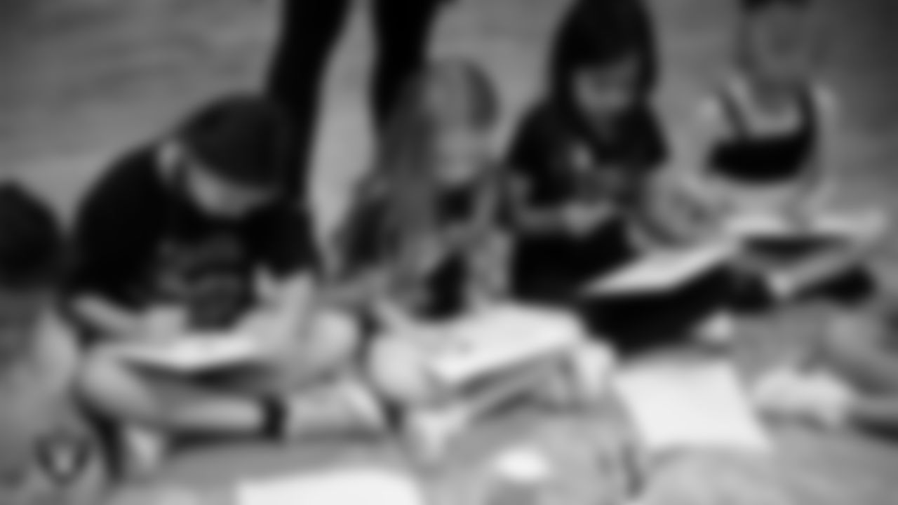 Dancers work on paintings during day one of summer camp at The Studio.