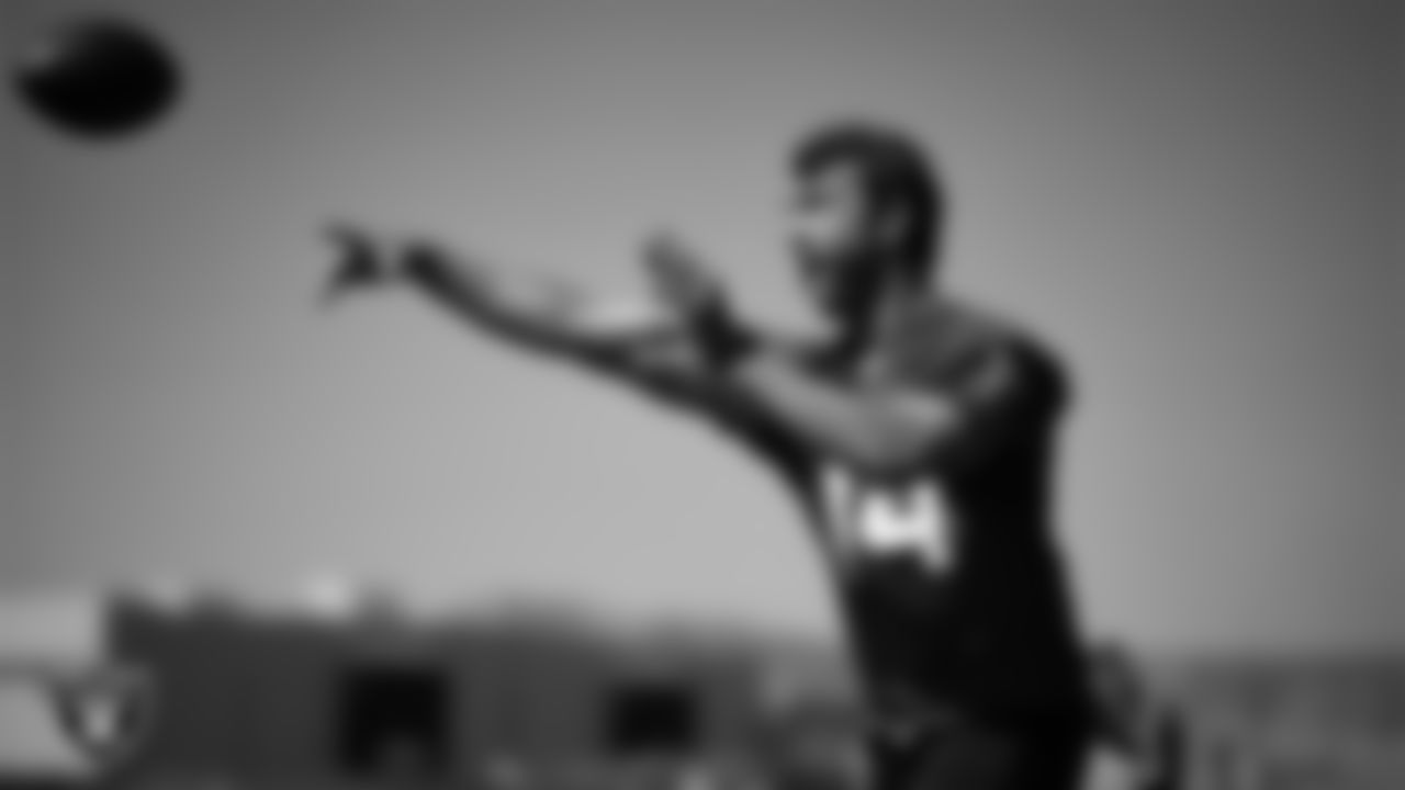 Las Vegas Raiders quarterback Carter Bradley (14) at a workout during phase two of the offseason program at Intermountain Health Performance Center.