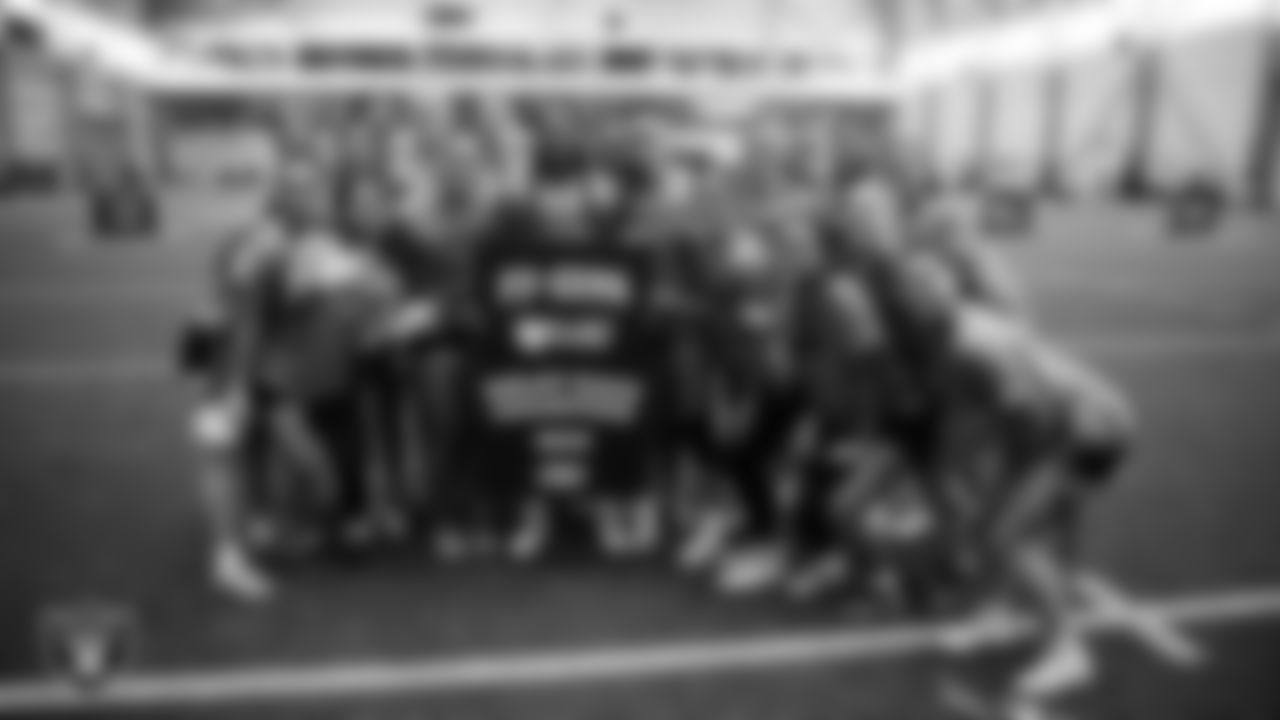 The winners of the relay race pose for a photo during a Nike 11-On event at Intermountain Health Performance Center.