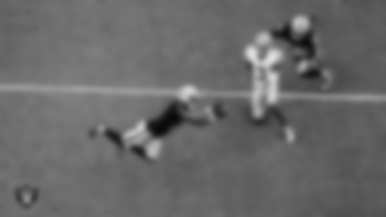 Las Vegas Raiders safety Jeremy Chinn (11) intercepts a pass during the preseason home game against the San Francisco 49ers at Allegiant Stadium.