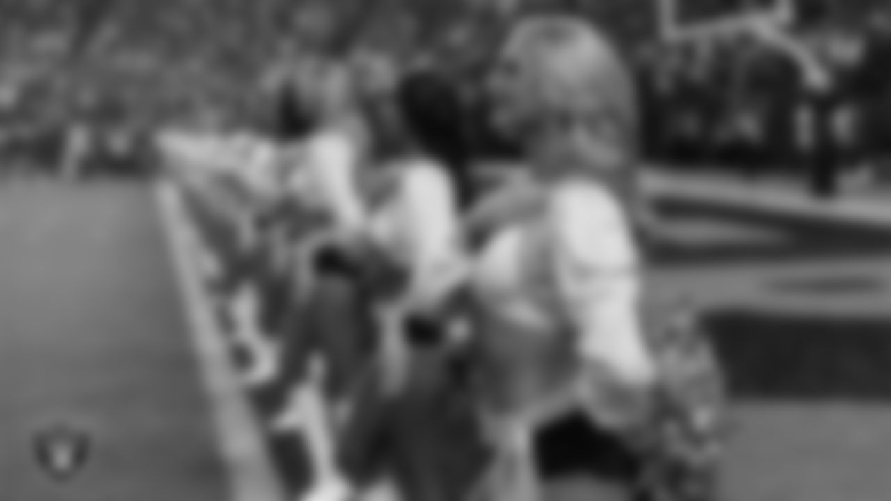 Raiderette Jessica during the national anthem before the regular season home game against the Los Angeles Chargers at Allegiant Stadium.