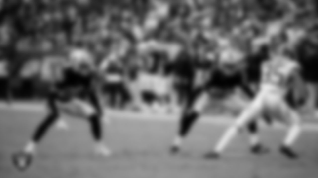 Las Vegas Raiders cornerback Darien Porter (26) and cornerback Decamerion Richardson (25) during the regular season home game against the Tennessee Titans at Allegiant Stadium.