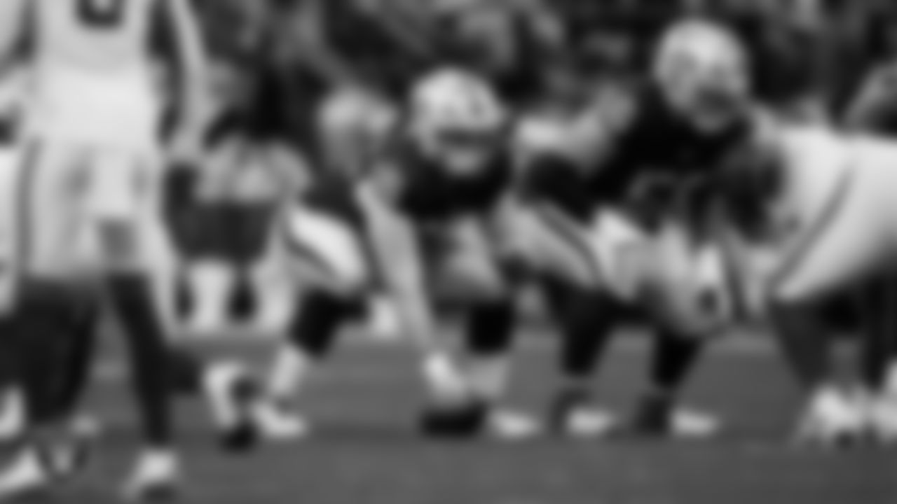 Las Vegas Raiders guard Alex Cappa (65) and guard Atonio Mafi (56) line up before the snap during the regular season home game against the New York Giants at Allegiant Stadium.