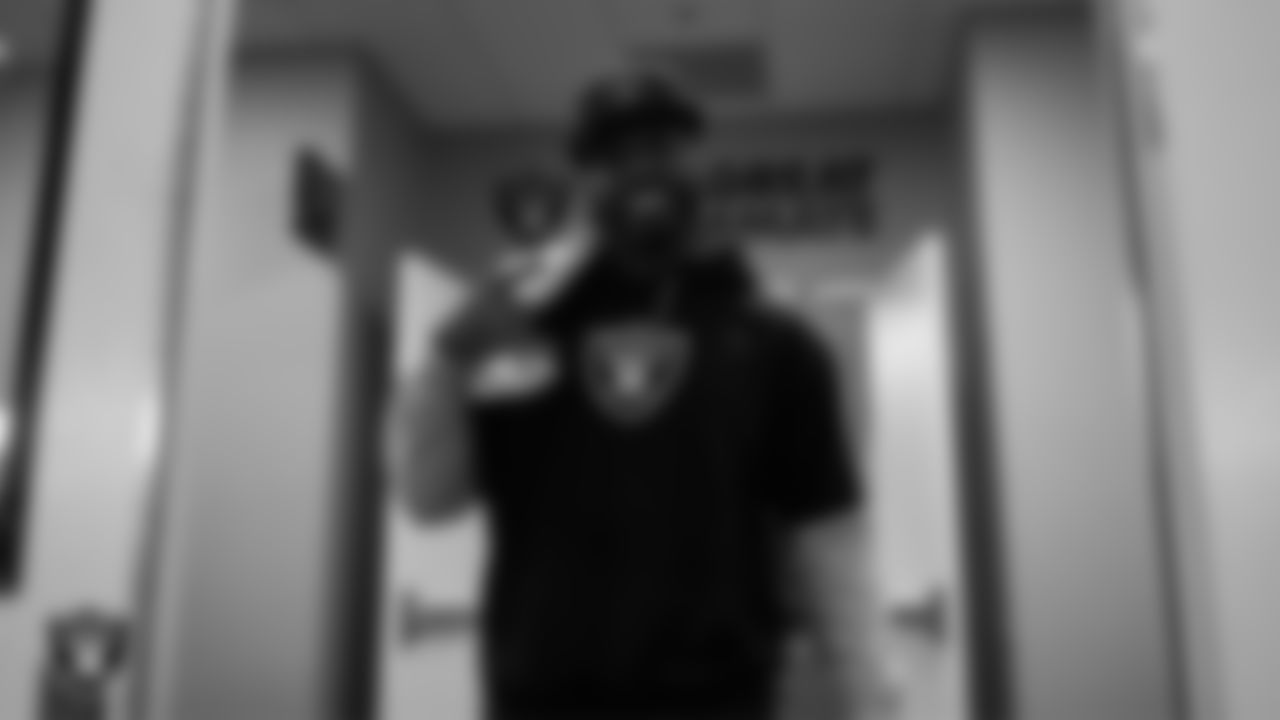 Las Vegas Raiders linebacker Elandon Roberts (52) walks out to the field for practice at Intermountain Health Performance Center.