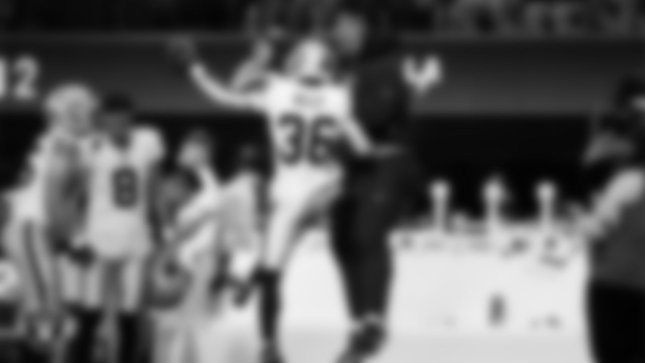 Las Vegas Raiders cornerback Kyu Blu Kelly (36) celebrates with offensvie lineman Laki Tasi (79) after making an interception during the regular season away game against the Los Angeles Chargers at SoFi Stadium.