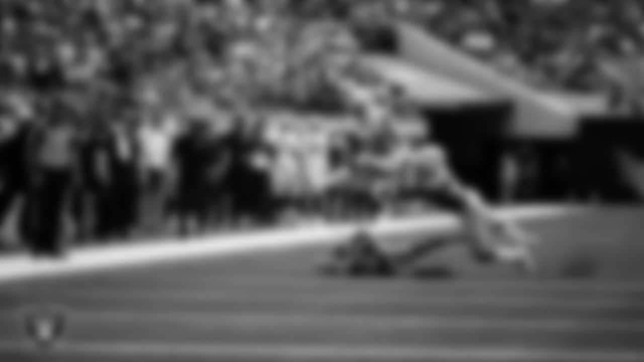 Las Vegas Raiders running back Alexander Mattison (22) runs after making a 31-yard touchdown catch during the regular season away game against the Los Angeles Chargers at SoFi Stadium, Sunday, September 8, 2024, in Inglewood, Calif.