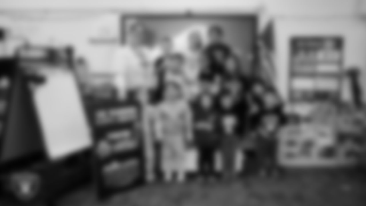 A class celebrates winning the Lil' Raiders School Challenge at Richard H. Bryan Elementary School.