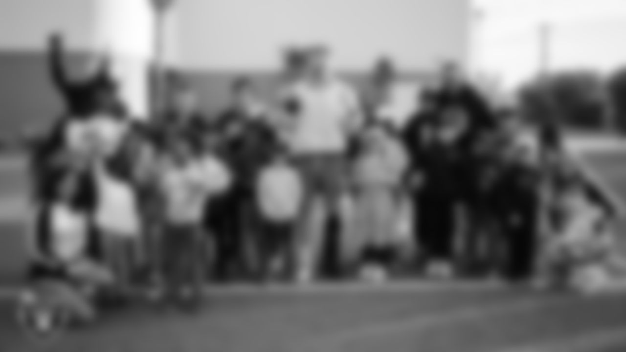 Las Vegas Raiders defensive end Maxx Crosby (98) during the "One for the Community" check presentation at Bill and Lillie Heinrich YMCA.